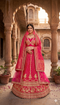 Traditional Indian Rani bridal lehenga crafted for global bride.
