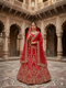 Bridal Red Raw Silk Lehenga with intricate work of beads