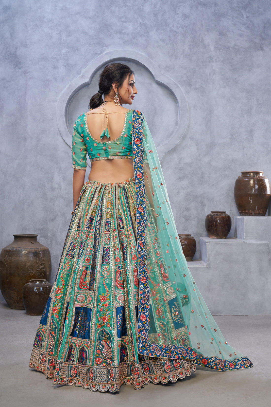 Graceful Green embedded by Thread and Sequin Embellished Lehengas