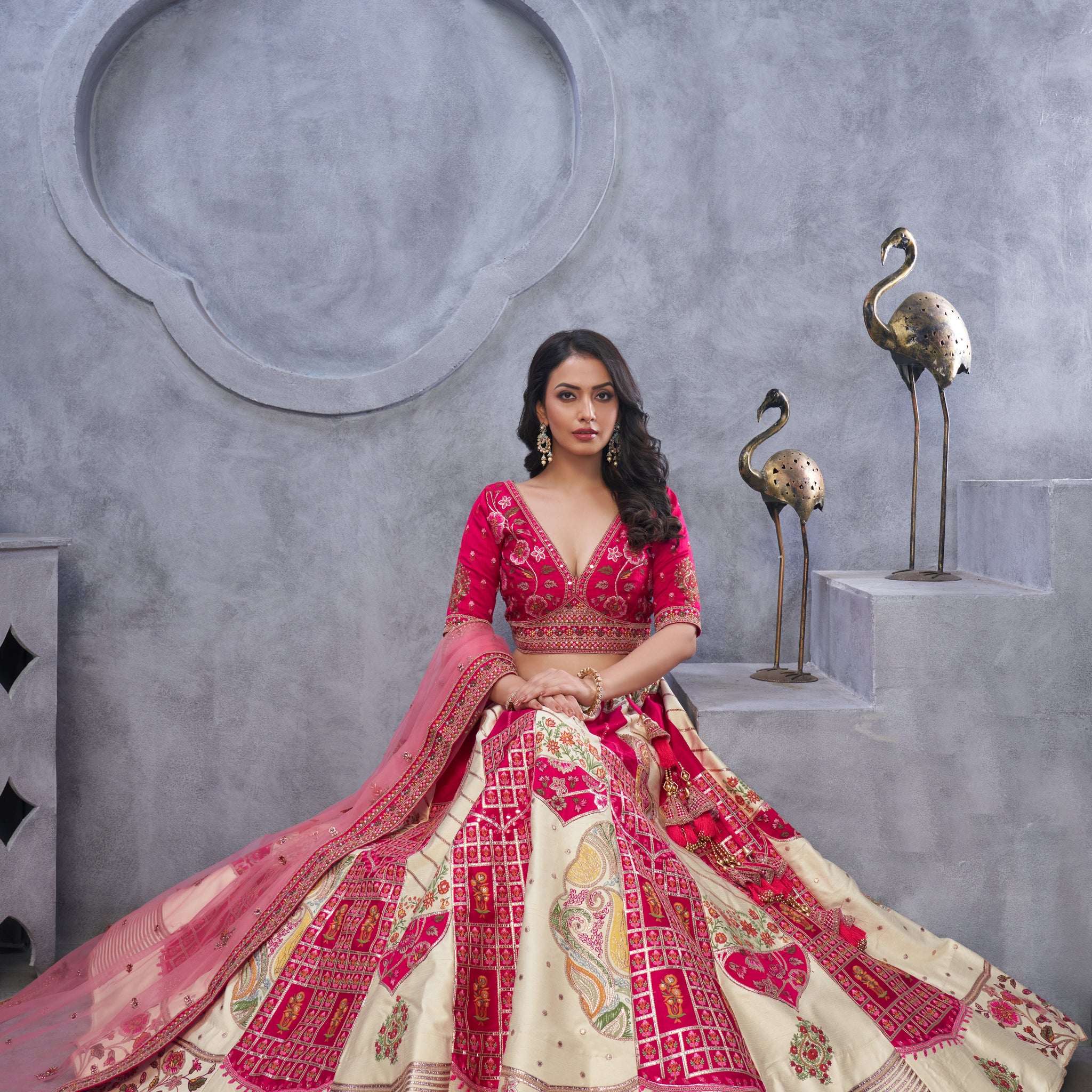 Regal Elegance: Red and White Raw Silk Lehenga with Paisley Motifs and Sheer Pink Dupatta