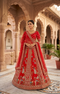 Classic Red Bridal Lehenga Crafted in Raw Silk with Rich Beads Work